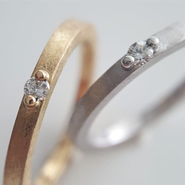 Kempkens-Atelier-Ring-Zweikorn-Brillant-Gelb-Gold-Weiss-Gold-eismatt